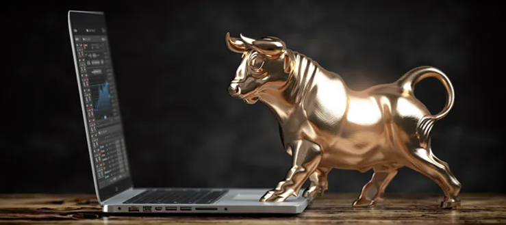 bull figure at laptop